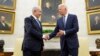 U.S. President Joe Biden (right) shakes hands with Israeli Prime Minister Benjamin Netanyahu at the White House in July. 