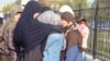 Родственницы некоторых осужденных по обвинению в терроризме. Атырау, 18 апреля 2012 года.