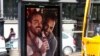 An advertisement promoting gay acceptance, which prompted a political backlash, is seen in Budapest in August 2019. 