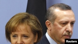 Tayyip Erdogan și Angela Merkel