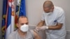 The Serbian health minister receives a dose of the Chinese-made Sinopharm vaccine in Belgrade on January 19.