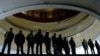 Vigilantes on both sides of the divide in Ukraine have formed groups to protect buildings that they control. In this picture, antigovernment activists protect Kyiv's "Ukrainian House," which was seized by protesters on January 26. 