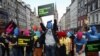 Protesters wearing Pussy Riot's signature balaclavas take part in an Amnesty International flash-mob demonstration in support of the punk group in Edinburgh, Scotland on August 14.