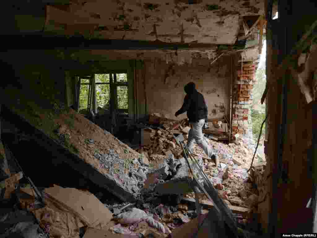 A neighboring apartment block that took a direct hit from a Grad (Hail) rocket in 2014.&nbsp;