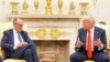 US President Donald Trump (right) meets with German Chancellor Friedrich Merz at the White House on June 5.