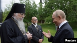 Путин және архиепископ Алексий