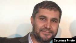 Farhod Odinaev is part of a group of self-exiled Tajik activists who have complained that their relatives were under pressure after activists pelted the car of President Emomali Rahmon with eggs while he was in Berlin for talks with German Chancellor Olaf Scholz in late September.