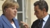 German Chancellor Angela Merkel (left) and French President Nicolas Sarkozy have been helping draft a plan to boost the eurozone rescue fund. 