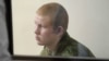 рядовий Валерій Пермяков у 5-му гарнізонному військовому суді Росії на території російської військової бази у вірменському місті Ґюмрі. 12 серпня 2015 року