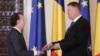 Romanian Prime Minister-designate Florin Citu (left) and President Klaus Iohannis (file photo)