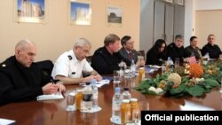 Armenia - Rear Admiral Mark Montgomery of the U.S. European Command (third from left) and other U.S. officials meet with Defense Minister Seyran Ohanian in Yerevan, 15Feb2012.