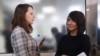 Dozhd TV producer Daria Zhuk (left) and BBC journalist Farida Rustamova arrive at the State Duma's Ethics Commission meeting in Moscow on March 21.