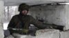 Український військовослужбовець у зоні АТО. Лютий 2015 року. Ілюстраційне фото