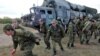 На учениях подразделения противоздушной обороны. На заднем плане - ракетная установка С-300.