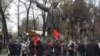 Ленин ескерткіші жанында тұрған Коммунистік партия мүшелері. Алматы, 7 қараша 2014 жыл. (Көрнекі сурет)