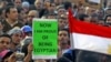 Protestçiler parlamentiň gabawyny hem-de Tahrir meýdançasyndaky lagerlerini berkitdiler