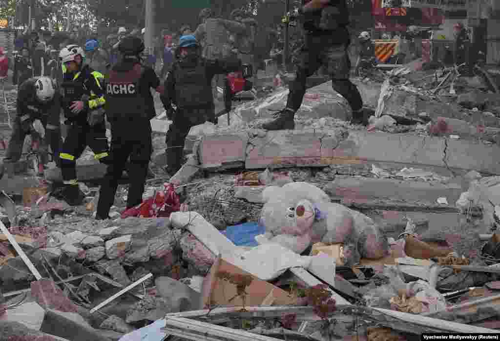 A child's soft toy lies in the rubble of the strike. Ukraine's President Volodymyr Zelenskiy posted images of the Kharkiv strikes to his social media feeds and called on Kyiv's allies to "stop the terror." 