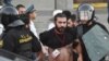 Armenia - Karo Sahakian, a photojournalist for Panarmenian.net, is detained by police in Yerevan, 23Jun2015.