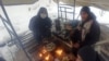 Migrants Exposed To Heavy Snow In Burned-Out Bosnian Tent Camp