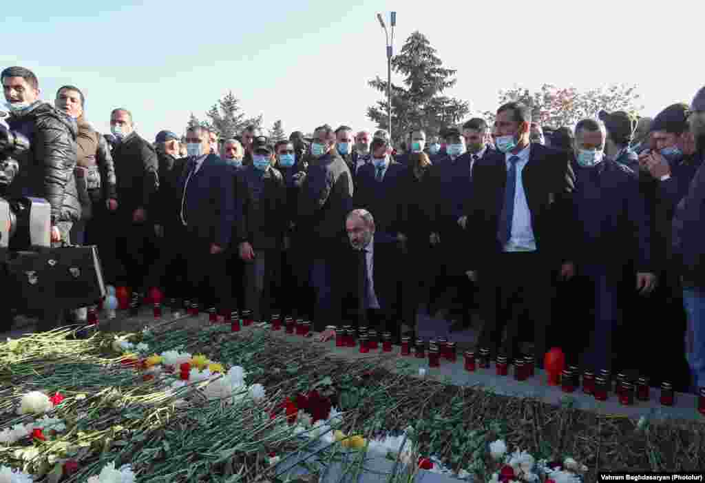 Amidst scuffles, the Armenian prime minister pays his respects at the military cemetery. Many Armenians are angered by Pashinian's handling of the conflict and shock announcement of a peace treaty that ceded swaths of land formerly controlled by ethnic Armenian forces back to Azerbaijan. 