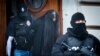 SLOVAKIA -- Police escorts Alena Zs, a suspect charged of premeditated murder of Slovak investigative journalist Jan Kuciak and his fiancee Martina Kusnirova after the hearing at Specialised Criminal Court in Banska Bystrica, September 30, 2018