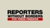 “Serhetsiz Reportýorlar” guramasynyň nyşany