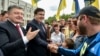 Михаил Саакашвили и Петр Порошенко меняются ролями