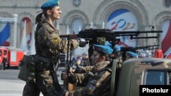 Armenia - Female soldiers take part in a military parade in Yerevan.