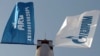 Armenia -- The flags of the ARG national gas operator and its dominant Russian shareholder, Gazprom.