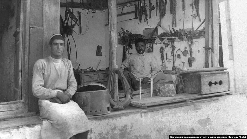 A saddler's shop in Bakhchysaray, 1920s. Horse breeding played a huge role in Crimean Tatar society, and horses always needed harnesses and saddles. During the period of the Crimean Khanate, from 1441 to 1783, the city of Qarasuvbazar (known today as Bilohirsk) was referred to as the capital of saddlers.