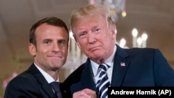 Președinții Donald Trump și Emmanuel Macron la conferința de presă de la Casa Albă, 24 aprilie 2018