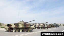 Azerbaijan - Russian-made tanks, artillery systems and attack helicopters put on display at a military base in Nakhichevan, 7Apr2014.