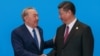 Президент Казахстана Нурсултан Назарбаев (слева) и президент Китая Си Цзиньпин на саммите «Один пояс, один путь». Пекин, 15 мая 2017 года.