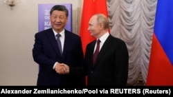 Si Đinping (levo) i Vladimir Putin na samitu BRIKS-a u Kazanju, Rusija, 22. oktobra 2024.