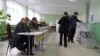 The Central Election Commission said that nearly 400,000 of the country's 2.8 million registered voters had cast ballots by late morning local time.