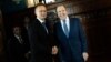 Hungarian Foreign Minister Peter Szijjarto (left) greets Russian counterpart Sergei Lavrov during a visit to Moscow in July.