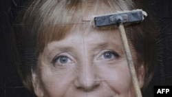 Bilbord sa likom Angele Merkel, Berlin 14. septembar 2009.