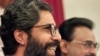 Pakistani Muttahida Quami Movement (MQM) Secretary-General Imran Farooq (left) in London in September 1999