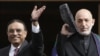 Pakistani President Asif Ali Zardari (left) and his Afghan counterpart, Hamid Karzai, in Istanbul on November 1