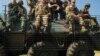 Прем&rsquo;єр-міністр України Арсеній Яценюк під час командно-штабних навчань із залученням американських військових &laquo;Безстрашний захисник 2015&raquo;. Яворівський полігон, 3 червня 2015 року