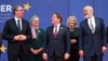 Serbian President Aleksandar Vucic (left), European Commissioner for Neighborhood and Enlargement Oliver Varhelyi (center) and Albanian Prime Minister Edi Rama (right) talk during a photo in Tirana on February 29.
