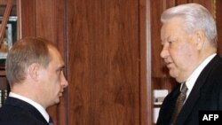 Preşedintele Boris Yeltsin şi premierul Vladimir Putin în 1999 