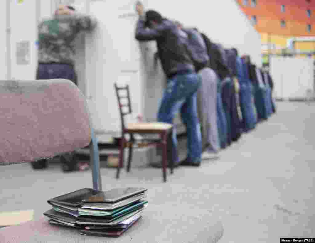 Hundreds of labor migrants were rounded up and detained in a series of raids on Moscow markets in July 2013. The raids followed an attack in which a Russian police officer was injured.