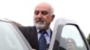 Armenia - Veteran politician Paruyr Hayrikian gets in his car after making a statement to the media in Yerevan, 28May2013.