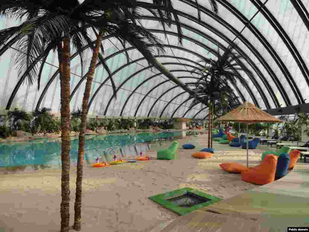 Inside the Khan Shatyr, an artificial beach stocked with sand from the Maldives awaits paying bathers. The extravagance of the new structures caused controversy in a country where the average annual household income around the time of Astana’s construction was less than $600.