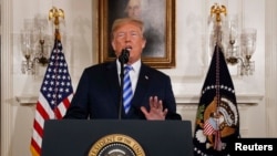 Trump announces withdrawal from Iran deal at the White House.