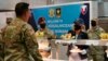  Jill Biden serves meals to U.S. troops during a visit to the Mihail Kogalniceanu Air Base in Romania on May 6