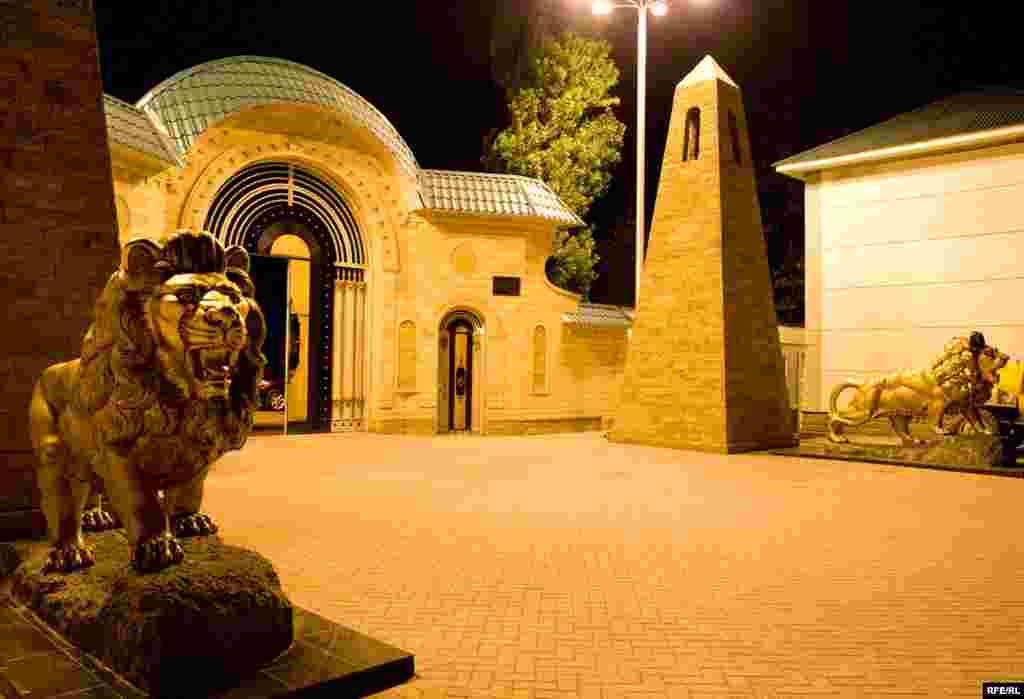 Lion sculptures guard the entrance to Kadyrov's mansion.