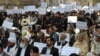 Afghan protesters demonstrate against a proposed U.S.-Afghan strategic security agreement in Kabul on October 24.