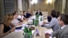 Ukrainian President Petro Poroshenko meets with Pavel Sheremet's family in Kyiv on July 11.